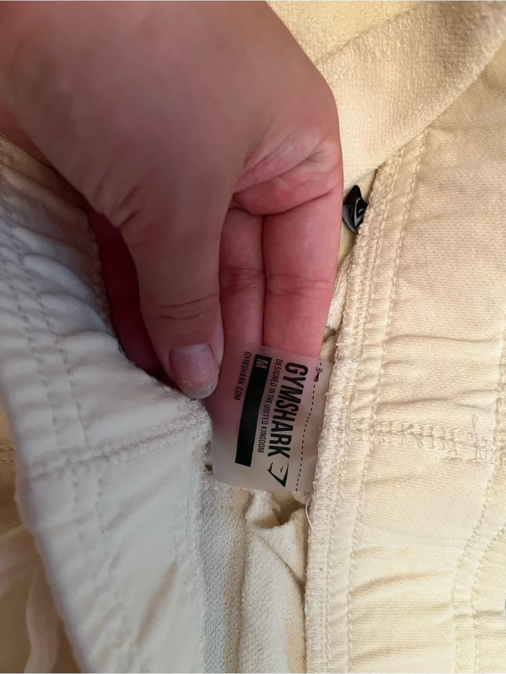 Gymshark Cream Kids Joggers with Black Zip Accents - Picture 3 of 3